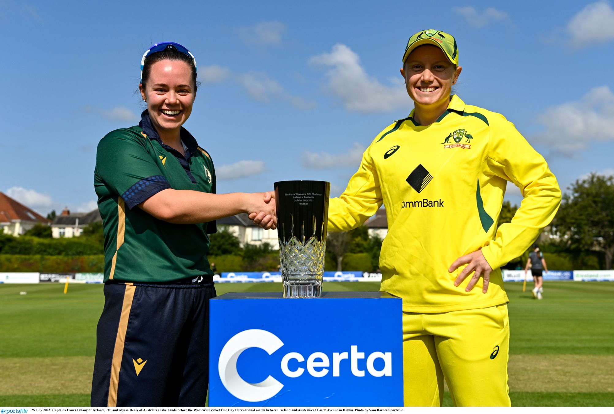 Ireland and Australia women’s cricket captains with trophy